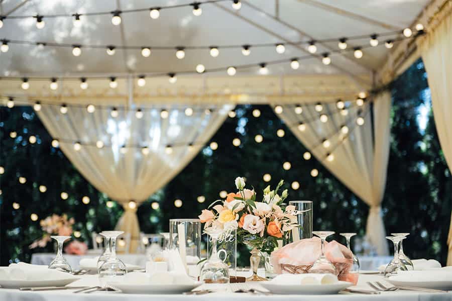 tent rentals interior with string lights and decorations