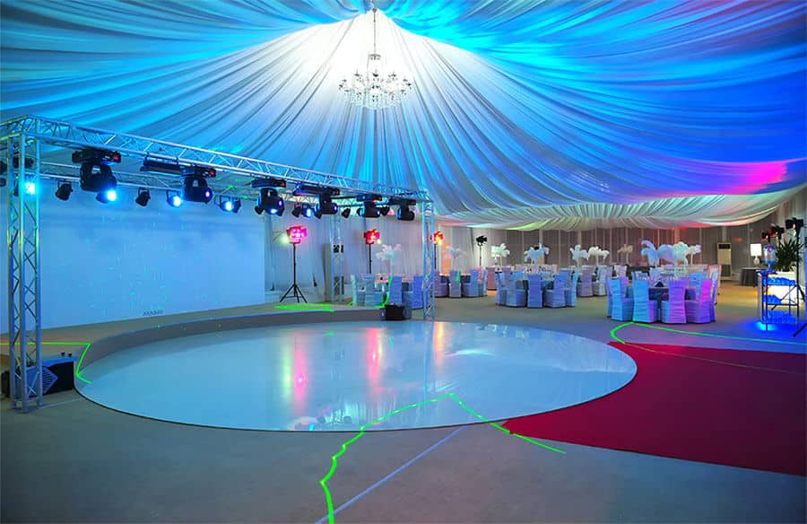 party tent interior with dance floor stage party lighting decorations